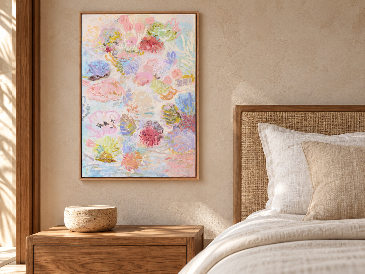 Beneath the Surface canvas art print by Prudence De Marchi, shown beside a linen bed and natural timber bedside table.