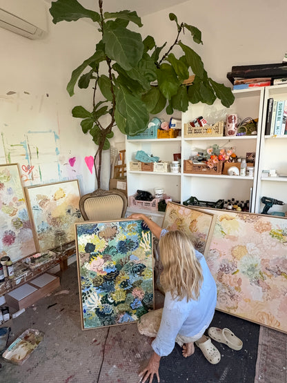 Prudence De Marchi beside Exploring the Depths and other FLOAT paintings in her daylight studio.