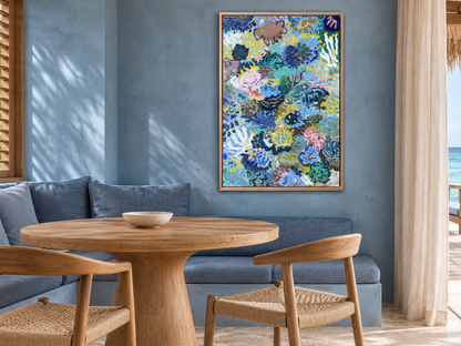 Exploring the Depths by Prudence De Marchi, a blue and green abstract painting above a blue dining banquette.